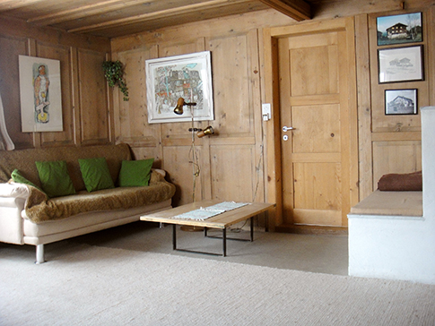 Wohnzimmer Casa Cadruvi  Wohnzimmer Ferienhaus Casa Cadruvi Giraniga Obersaxen Graubünden